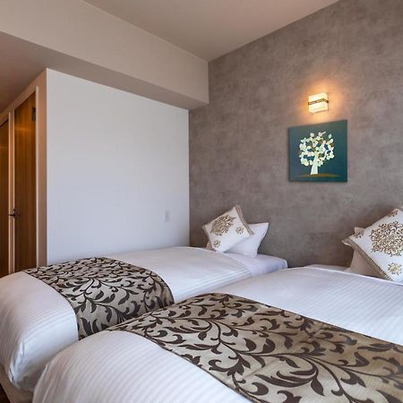 Aparthotel Mr Kinjo 万座ビーチ前 Onna Esterno foto