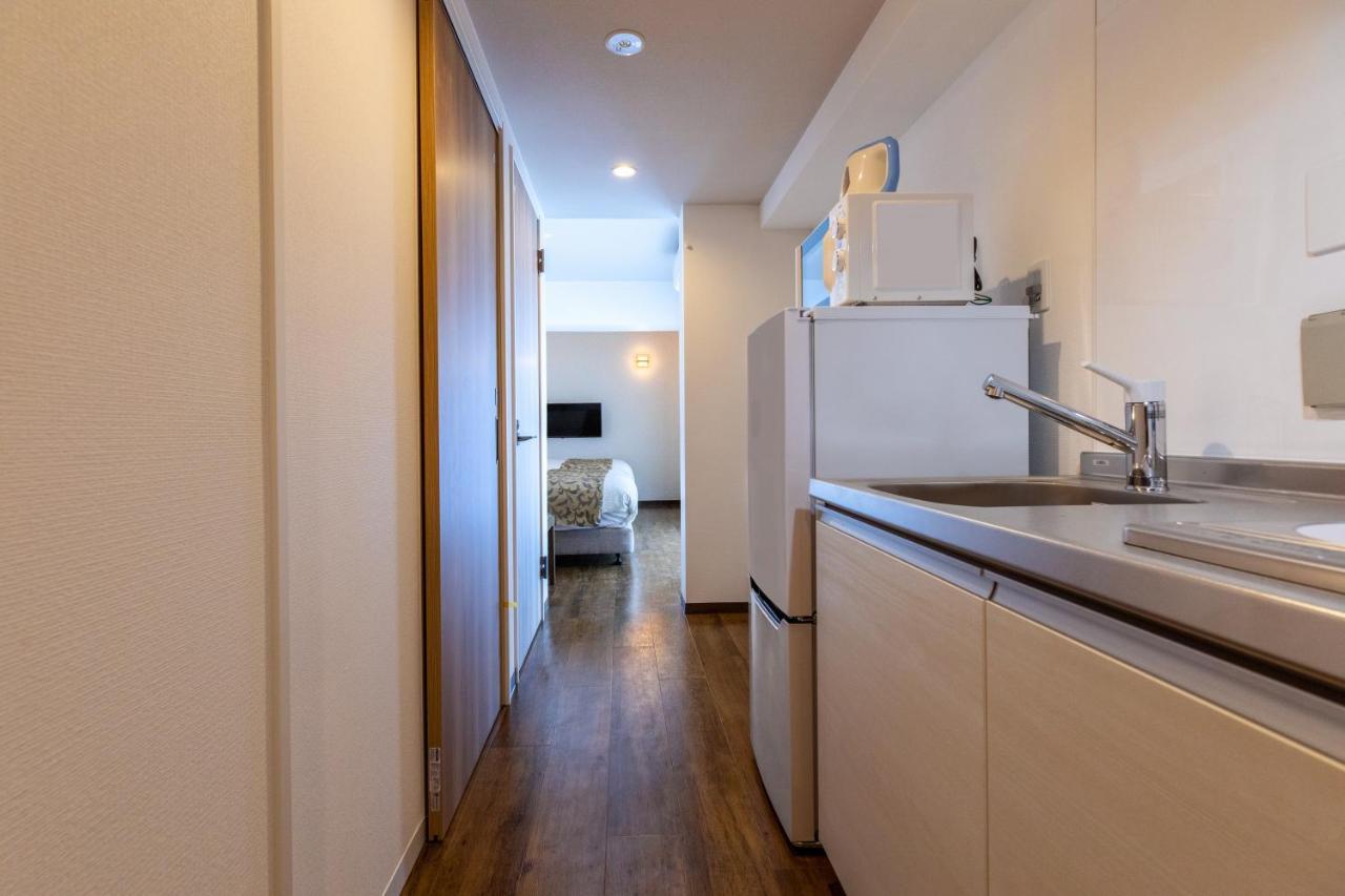 Aparthotel Mr Kinjo 万座ビーチ前 Onna Esterno foto