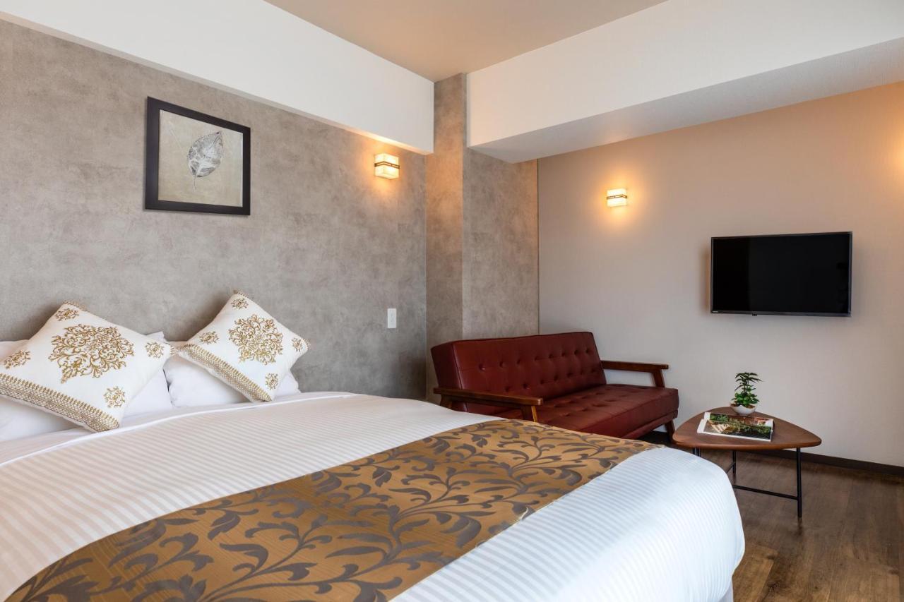 Aparthotel Mr Kinjo 万座ビーチ前 Onna Esterno foto