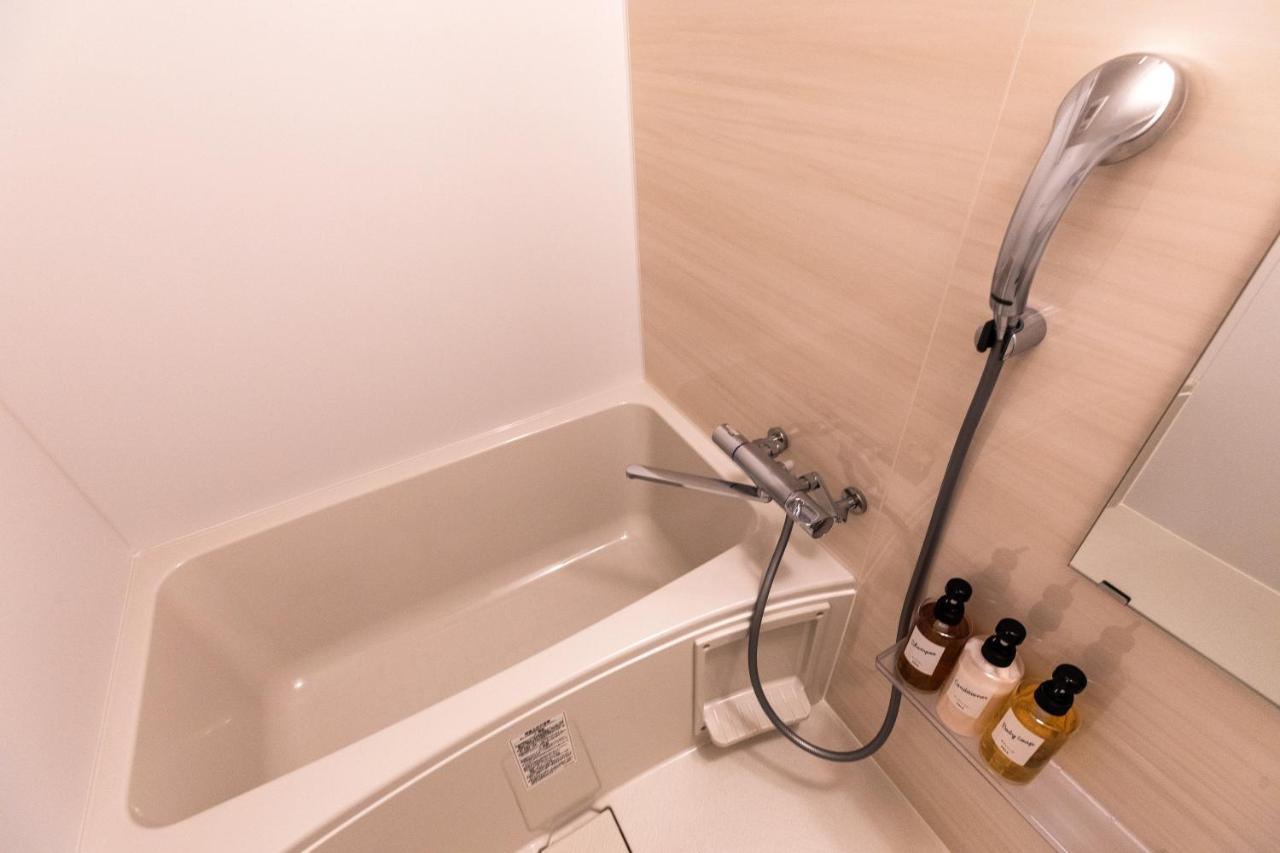 Aparthotel Mr Kinjo 万座ビーチ前 Onna Esterno foto