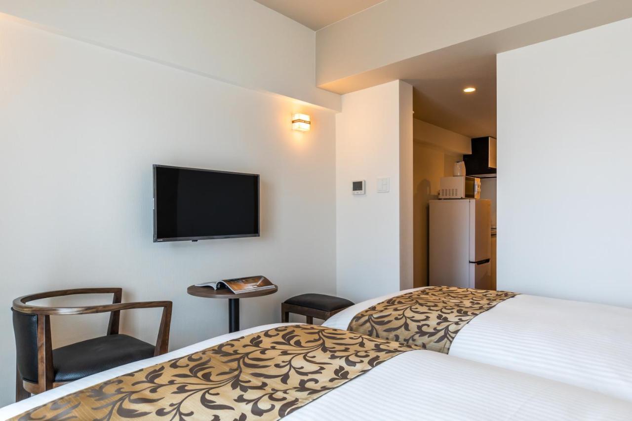 Aparthotel Mr Kinjo 万座ビーチ前 Onna Esterno foto