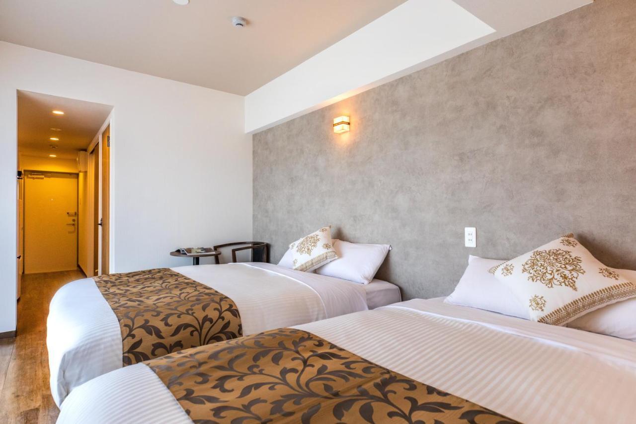 Aparthotel Mr Kinjo 万座ビーチ前 Onna Esterno foto