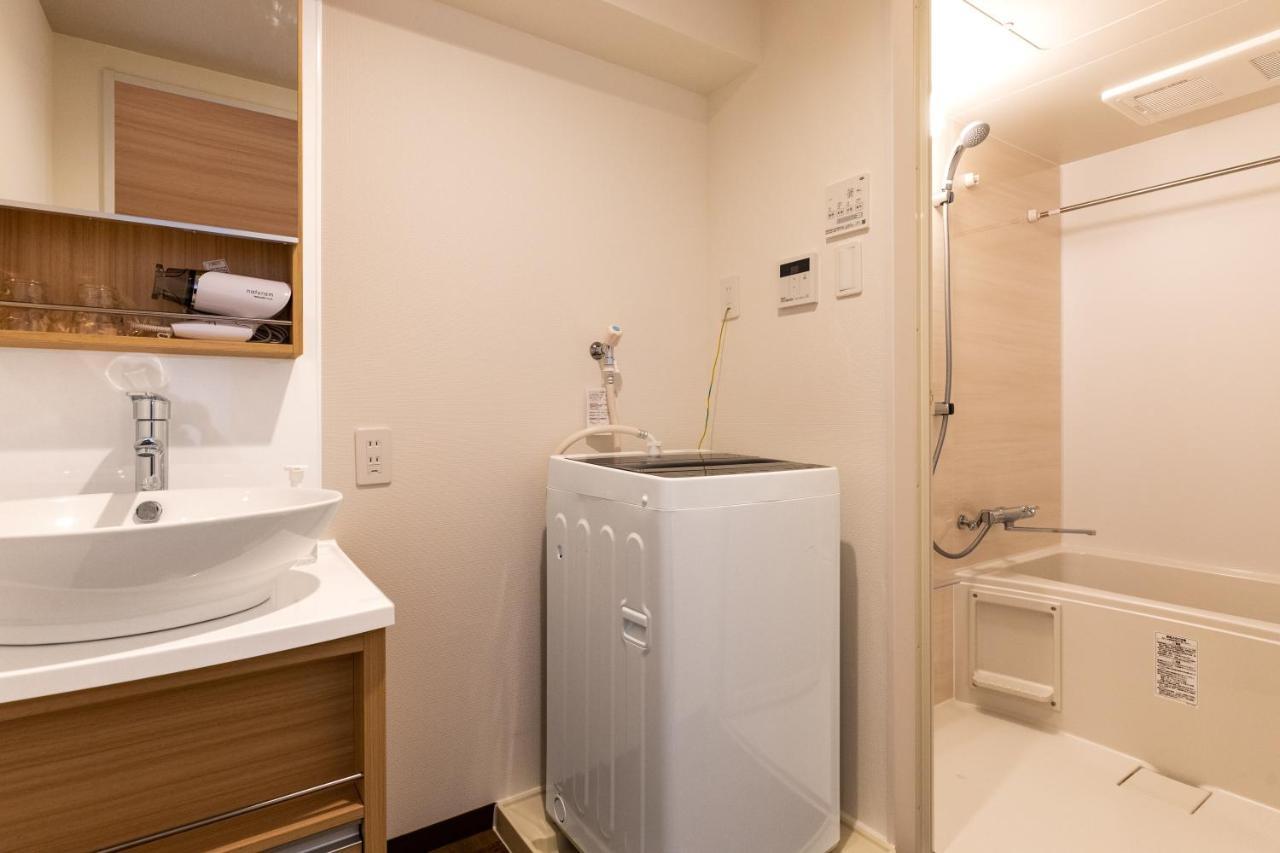 Aparthotel Mr Kinjo 万座ビーチ前 Onna Esterno foto